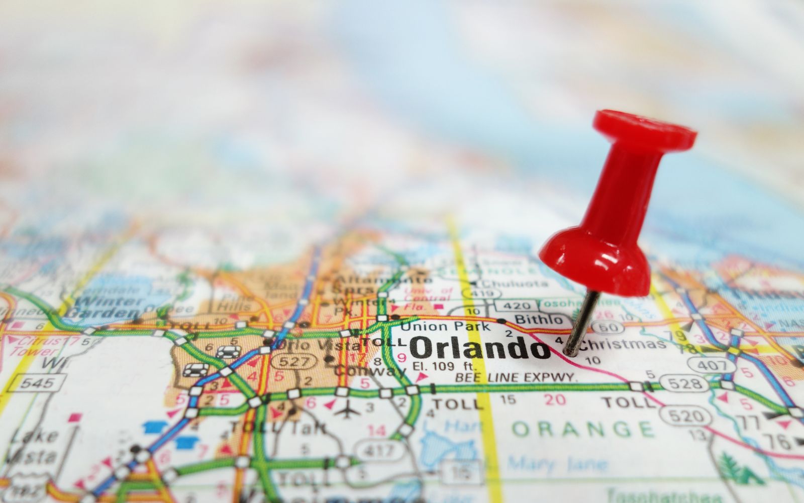 map of Orlando, Florida with a thumbtack